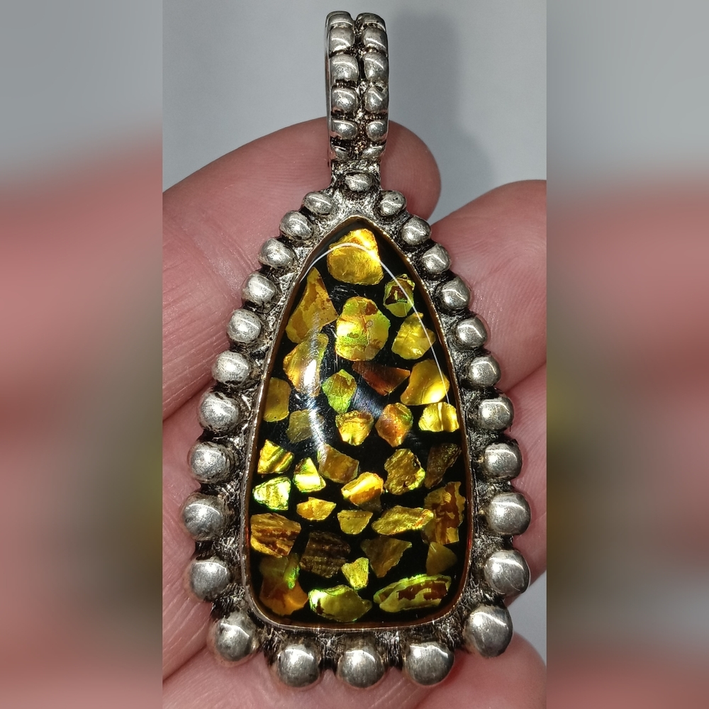 Silver Pendant and earring set. Chain not included. Yellow, orange Abalone?